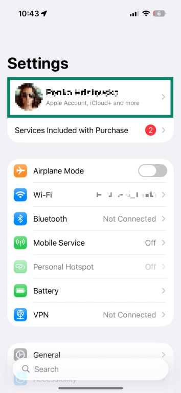 The "Settings" app on an iPhone. The user account tab at the top is highlighted.