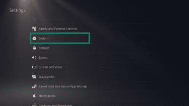 The PlayStation 5 "Settings" menu. The "System" option is highlighted.